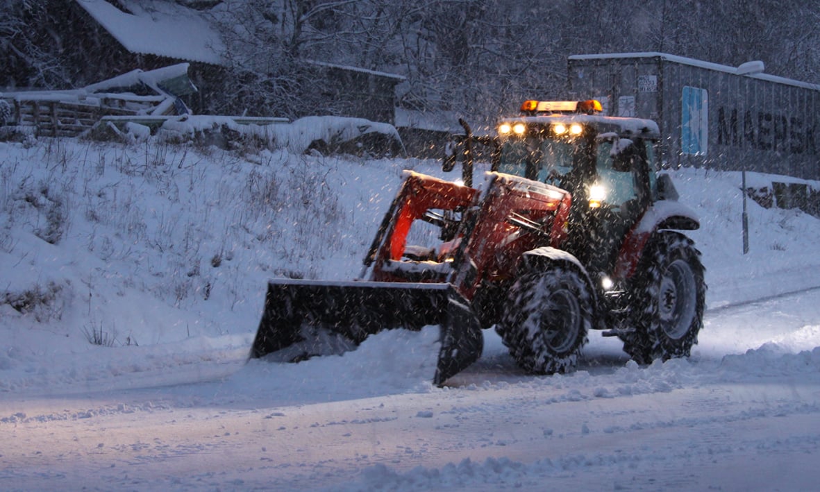 Tractor driving in snow